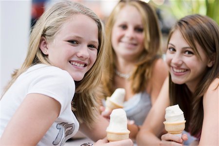 sitting child eat ice cream - Friends Eating Ice Cream Stock Photo - Rights-Managed, Code: 700-01029918