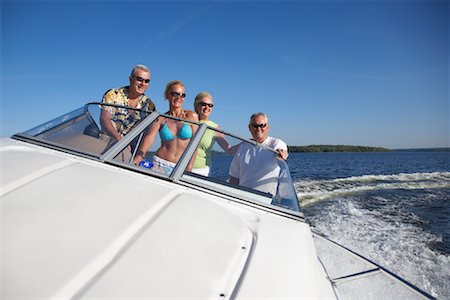 simsearch:700-01223364,k - People in Speedboat Foto de stock - Direito Controlado, Número: 700-01036984