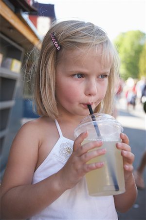 Girl Drinking from Plastic Cup Stock Photo - Rights-Managed, Code: 700-01030085