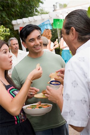 family gathering, holiday - People Eating at Family Gathering Stock Photo - Rights-Managed, Code: 700-01041255