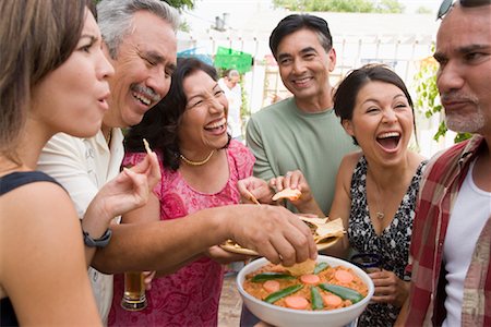 senior woman and profile and closeup and hispanic - People Eating at Family Gathering Stock Photo - Rights-Managed, Code: 700-01041257