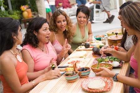 family reunions barbecues - Women Preparing Food at Family Gathering Stock Photo - Rights-Managed, Code: 700-01041269