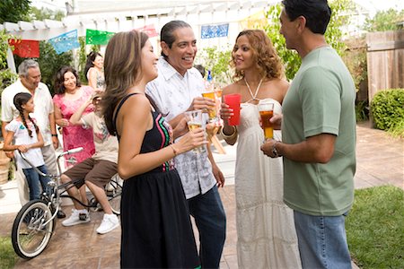 photos latin family gathering outside - People Drinking at Family Gathering Stock Photo - Rights-Managed, Code: 700-01041276