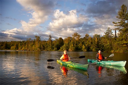 senior citizens kayaking - Couple Kayaking Stock Photo - Rights-Managed, Code: 700-01042152