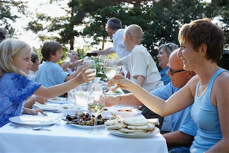 family eating dinner on special occasion - Family Celebrating Stock Photo - Rights-Managed, Code: 700-01042588