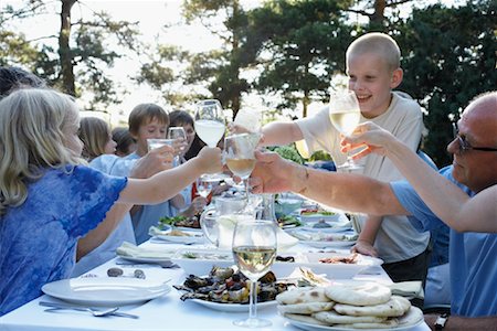 picture of family celebration meal in a dinner party - Family Celebrating Stock Photo - Rights-Managed, Code: 700-01042589