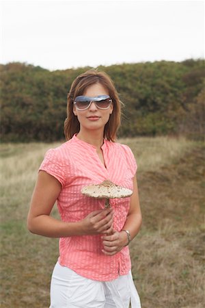 simsearch:700-00954536,k - Portrait of Woman Holding Mushroom Stock Photo - Rights-Managed, Code: 700-01042803