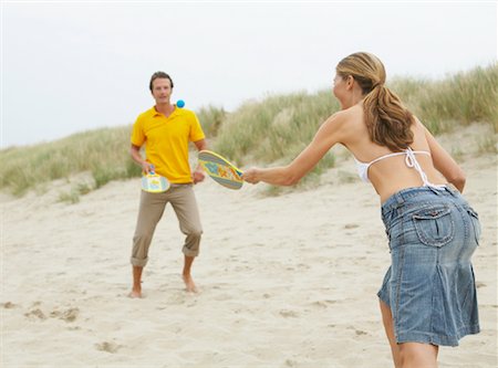 Couple Playing Paddle Ball on Beach Stock Photo - Rights-Managed, Code: 700-01042909