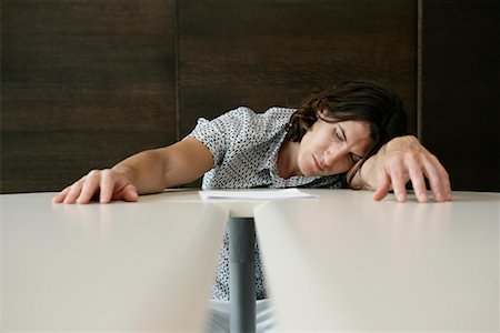 sleeping on boardroom table - Businessman Sleeping in Boardroom Stock Photo - Rights-Managed, Code: 700-01042983