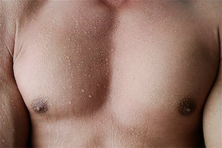 Close-Up of Man's Chest Foto de stock - Con derechos protegidos, Código: 700-01043035