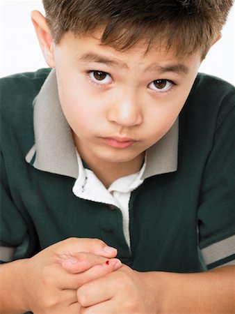 Portrait of Young Boy Showing Pinky Finger After Drawing Blood Foto de stock - Con derechos protegidos, Código: 700-01043513