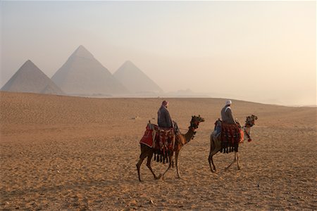 pyramid of menkaure - Riders on Camels, Giza Pyramids Giza, Egypt Stock Photo - Rights-Managed, Code: 700-01043626