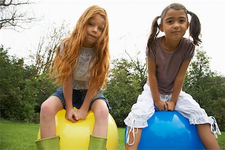 Girls on store space hoppers