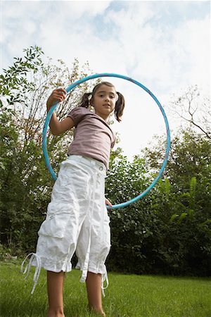 Girl Holding Hula-Hoop Stock Photo - Rights-Managed, Code: 700-01072077