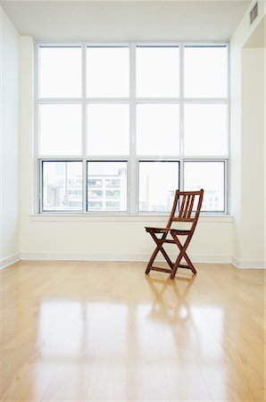 folding chair home - Chair in Empty Condo Stock Photo - Rights-Managed, Code: 700-01073433