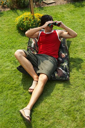 Man Looking Through Binoculars Stock Photo - Rights-Managed, Code: 700-01073612