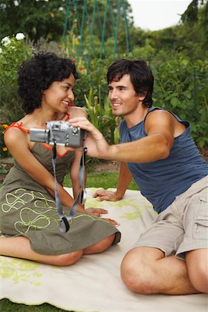 Couple Taking Pictures Outdoors Stock Photo - Rights-Managed, Code: 700-01073632