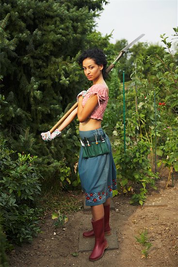 Woman Gardening Stock Photo - Premium Rights-Managed, Artist: Masterfile, Image code: 700-01073648