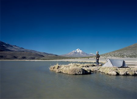 Man Camping Next to Lake, Enquelga, El Norte Grande Chile Stock Photo - Rights-Managed, Code: 700-01084051
