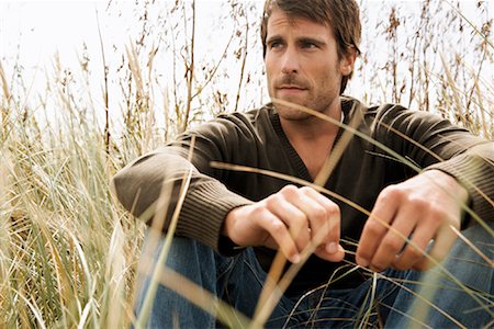 simsearch:700-01082891,k - Portrait of Man Sitting in Long Grass Stock Photo - Rights-Managed, Code: 700-01082837