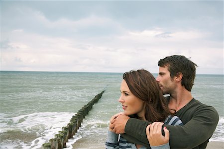 simsearch:700-01082891,k - couple Embracing on Beach Stock Photo - Rights-Managed, Code: 700-01082875