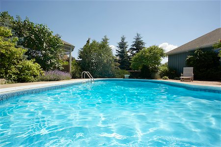 swimming pool housing - Suburban Backyard Pool Stock Photo - Rights-Managed, Code: 700-01083069