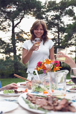 summer party wine - Woman at Picnic Stock Photo - Rights-Managed, Code: 700-01083611