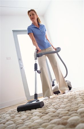 simsearch:700-01083983,k - Woman Vacuuming Stock Photo - Rights-Managed, Code: 700-01083982