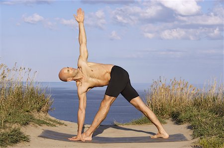 L'homme pratique de Yoga Photographie de stock - Rights-Managed, Code: 700-01109747