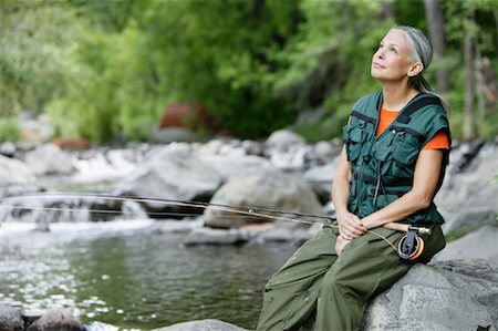 Portrait of Woman Fishing Foto de stock - Con derechos protegidos, Código: 700-01109782