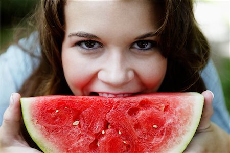 simsearch:400-08155951,k - Girl Biting Watermelon Stock Photo - Rights-Managed, Code: 700-01109790
