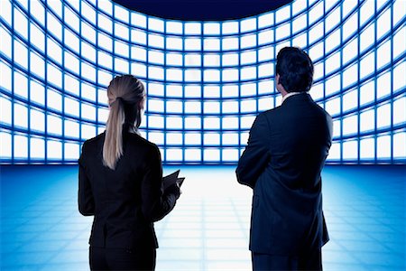 Business People Looking at Video Wall Foto de stock - Con derechos protegidos, Código: 700-01109918