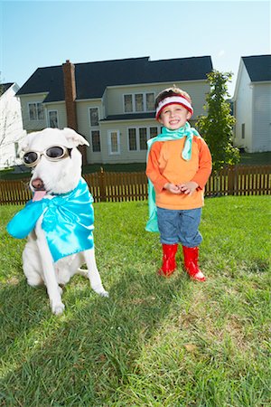 Boy and Dog in Costumes Stock Photo - Rights-Managed, Code: 700-01100005