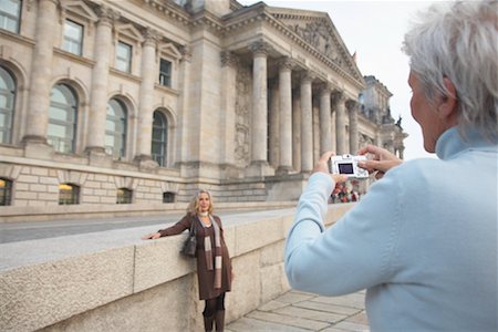 simsearch:600-02637318,k - Woman Posing for Photo in Front of the Reichstag, Berlin, Germany Stock Photo - Rights-Managed, Code: 700-01100254