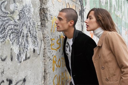 detail of a concrete wall - Couple Looking Through the Berlin Wall, Berlin, Germany Stock Photo - Rights-Managed, Code: 700-01100341