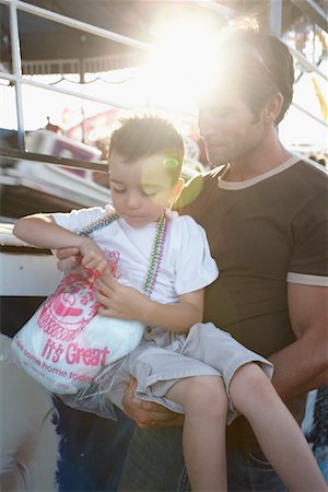 family eating light - Father and Son at Amusement Park, Toronto, Ontario, Canada Stock Photo - Rights-Managed, Code: 700-01110118