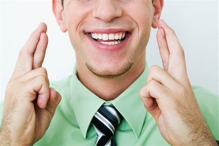 Businessman Crossing Fingers Stock Photo - Rights-Managed, Code: 700-01110570