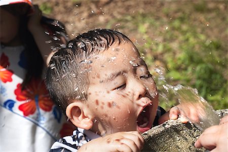 drink flowing - Boy at Water Fountain Stock Photo - Rights-Managed, Code: 700-01110610