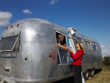 retro men drinking - Couple with Camper Stock Photo - Rights-Managed, Code: 700-01111449