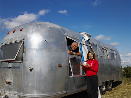 retro women camping - Portrait of Couple with Camper Stock Photo - Rights-Managed, Code: 700-01111450