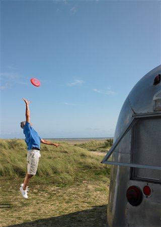 Man Playing Frisbee Foto de stock - Con derechos protegidos, Código: 700-01111485