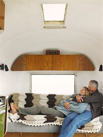 retro women camping - Couple Lying Down in Camper Stock Photo - Rights-Managed, Code: 700-01111493