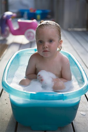 Child in Bathtub on Deck Stock Photo - Rights-Managed, Code: 700-01111946