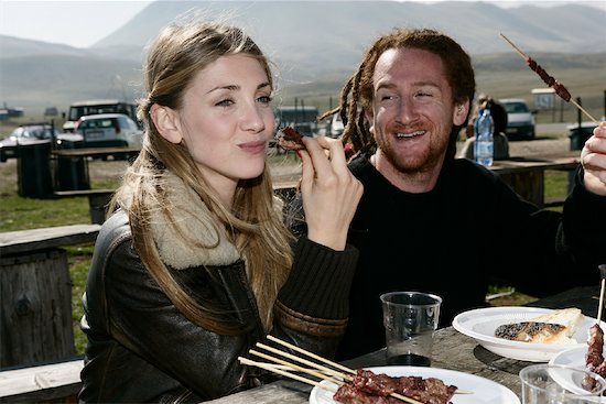 Couple Eating Outdoors Stock Photo - Premium Rights-Managed, Artist: Siephoto, Image code: 700-01112169