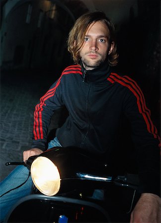 Portrait of Man on a Scooter Foto de stock - Direito Controlado, Número: 700-01124749