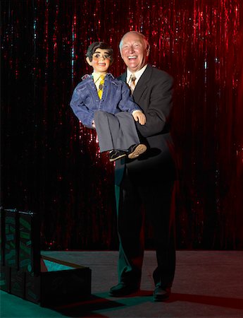 simsearch:700-01120571,k - Ventriloquist on Stage Fotografie stock - Rights-Managed, Codice: 700-01120493