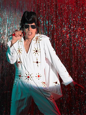 people singing on stage - Elvis Impersonator on Stage Stock Photo - Rights-Managed, Code: 700-01120582