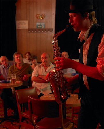 pictures of a man playing saxophone - Saxophone Player Performing Stock Photo - Rights-Managed, Code: 700-01123658