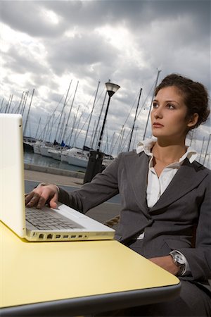 Businesswoman Using Laptop Stock Photo - Rights-Managed, Code: 700-01164589