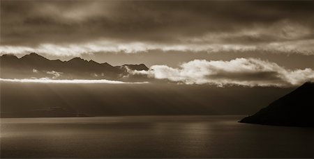 Sunrise Over the Remarkable Mountains and Lake Wakatipu, New Zealand Fotografie stock - Rights-Managed, Codice: 700-01164889